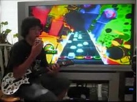 左手にギターヒーロー、右手にルービックキューブ 同時にプレイしてクリア！