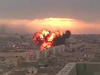 リビアの市街地に式典に参加中の戦闘機が墜落。その瞬間の映像が撮影される。